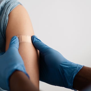 Multiple COVID-19 Vaccine Doses Reduce Symptoms