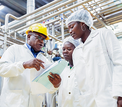 Factory Manager Training the Newly Appointed Female Trainees_400x350